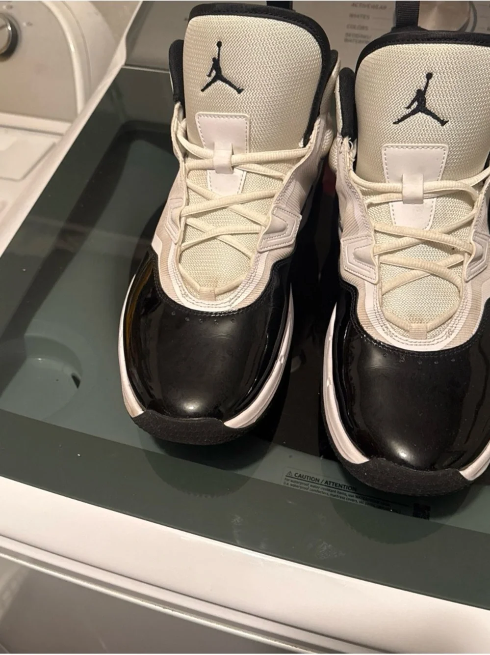 Nike Jordan Men’s Black / White High-Top Sneakers